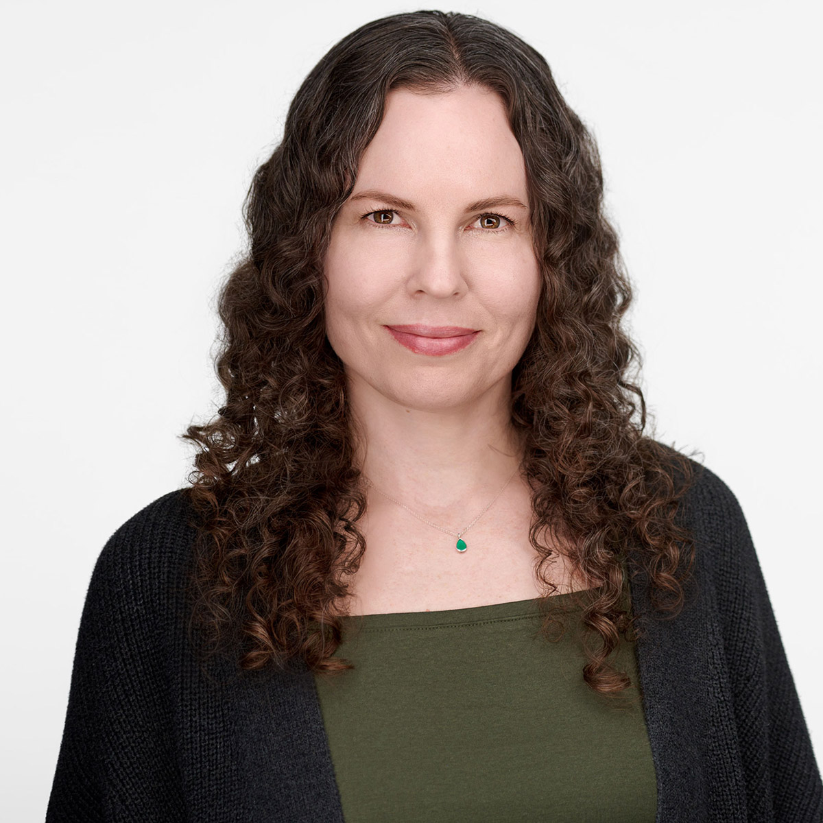 BreeAnderson_Headshot photo depicting a mental health counselors working with a client